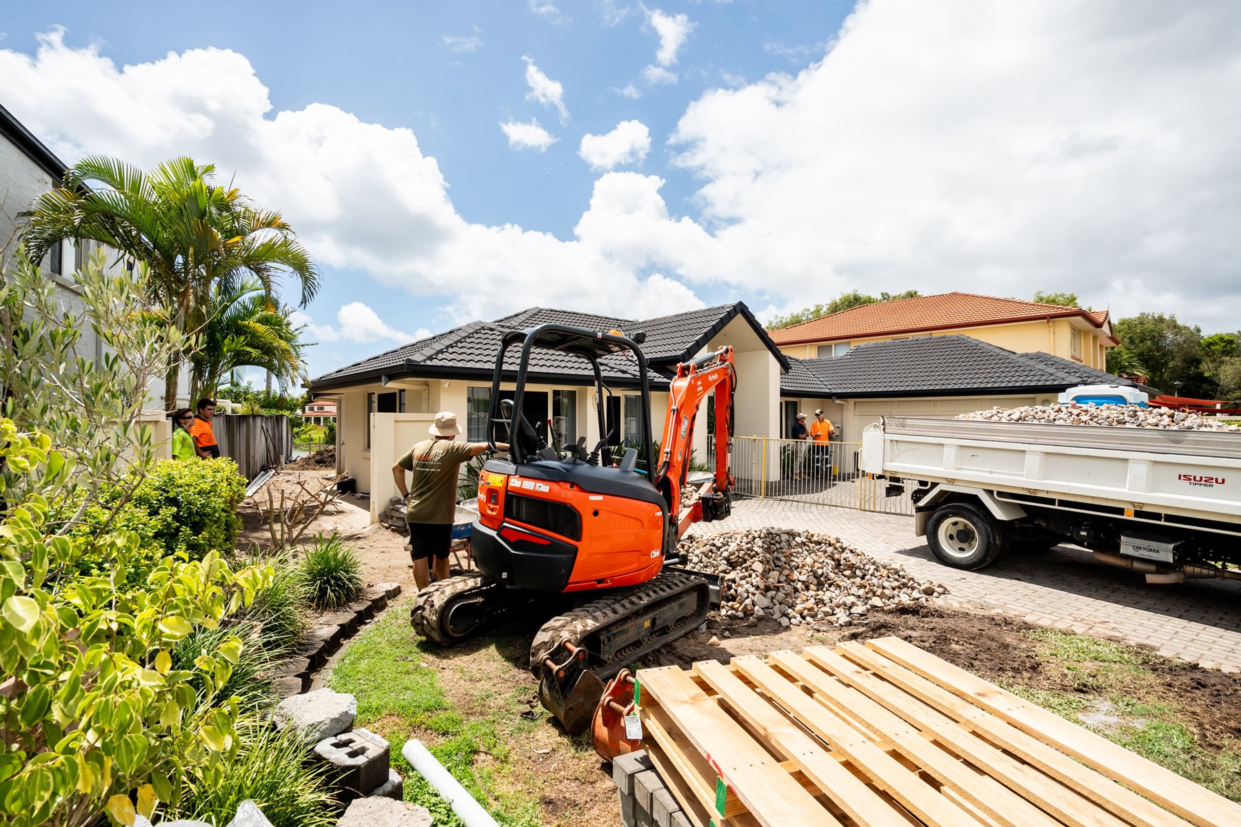 excavator Lynx Landscaping team on site